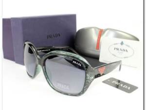 Óculos de Sol Fem. Prada